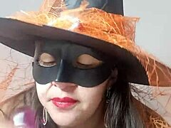 Mature woman dresses up as Halloween witch and pleasures herself for me