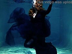 Arya Grander's seductive underwater performance in a swimming pool