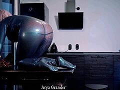 Mature seductress in alluring attire indulging in playful teasing - Arya Grander